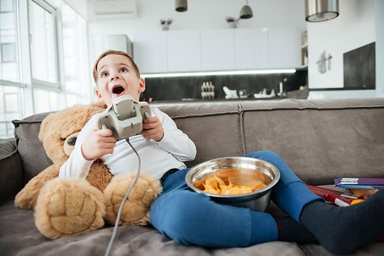 boy-playing-video-games-with-food boy-playing-video-games-with-food