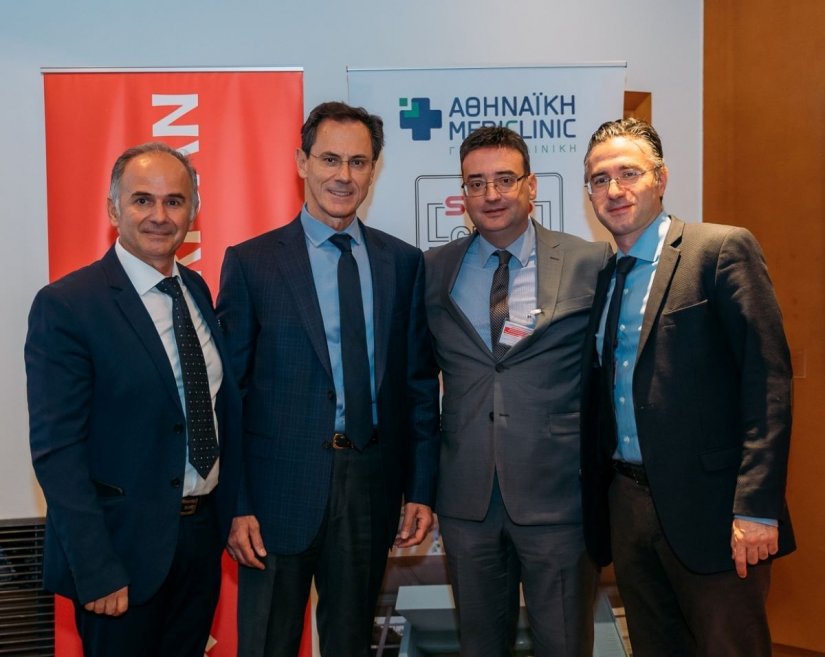 Οι τρείς ιατροί ομιλητές Δρ Χ. Ηλίας, Δρ Ν. Κουτσογούλας και Δρ Μ. Καραβιτάκης με τον Α. Γερονικολάου, γενικό διευθυντή της Αθηναϊκής Mediclinic.
